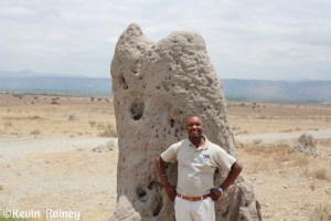 Our guide Emil by a termite mound